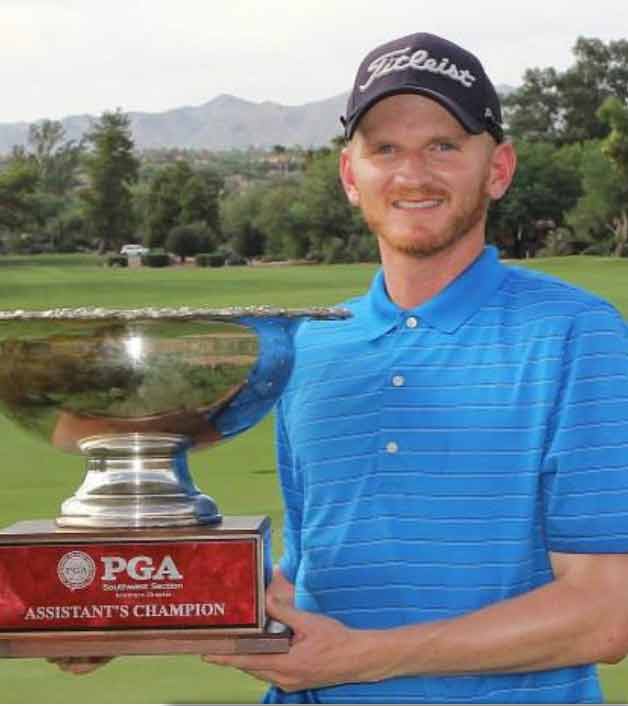 derek deminsky holds trophy