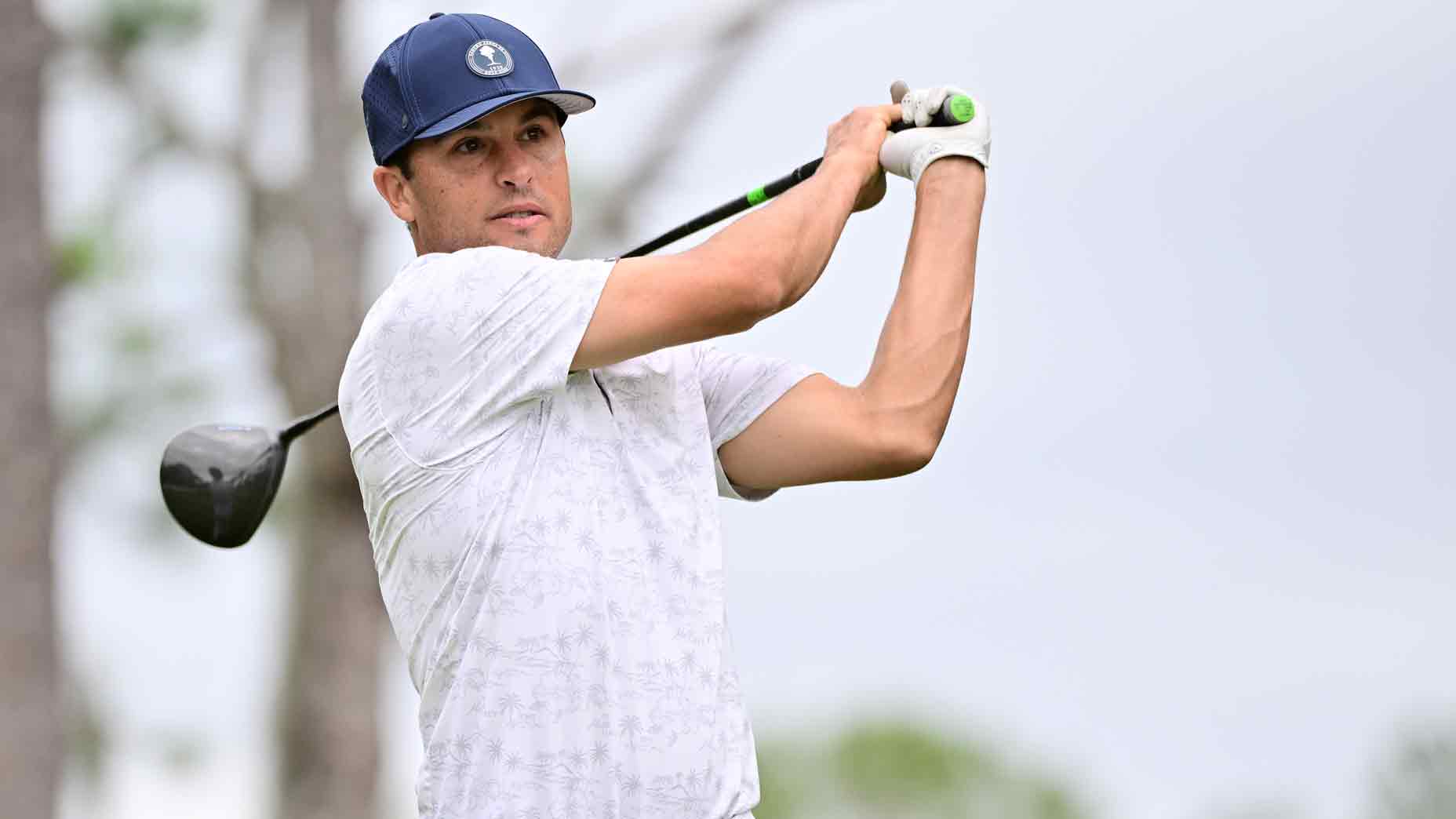 Former soccer player Landon Donovan plays his shot from the eighth tee during the first round of the Hilton Grand Vacations Tournament of Champions at Lake Nona Golf & Country Club on January 18, 2024 in Orlando, Florida.